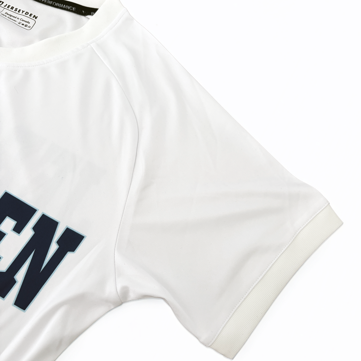 Close-up of a white short-sleeve athletic top.